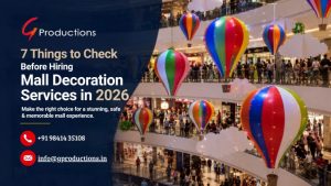 Realistic mall atrium decorated with colorful hot-air balloons, featuring 7 key checks for hiring mall decoration services in 2026.